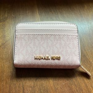 MK travel sized zip around wallet